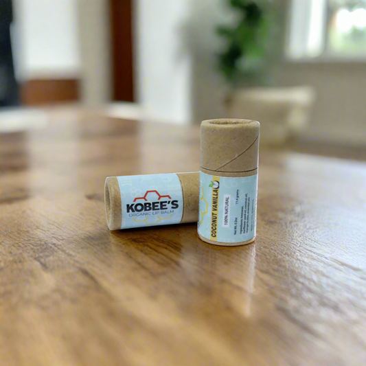 Kobbee's coconut lip balm laying down and standing up