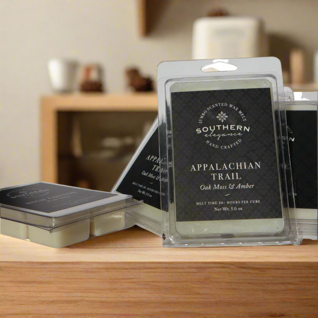 Black label that says 5oz Appalachian Trail Oak Moss & Amber handcrafted jumbo wax melt. Melt time 20 hours per cube